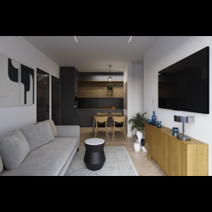 A modern living room with a sofa, wooden furniture, a kitchen area, and stylish decor elements.